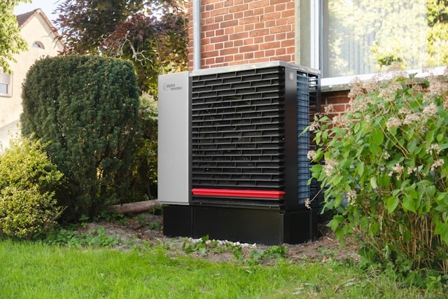 A modern heat pump installed outside a home