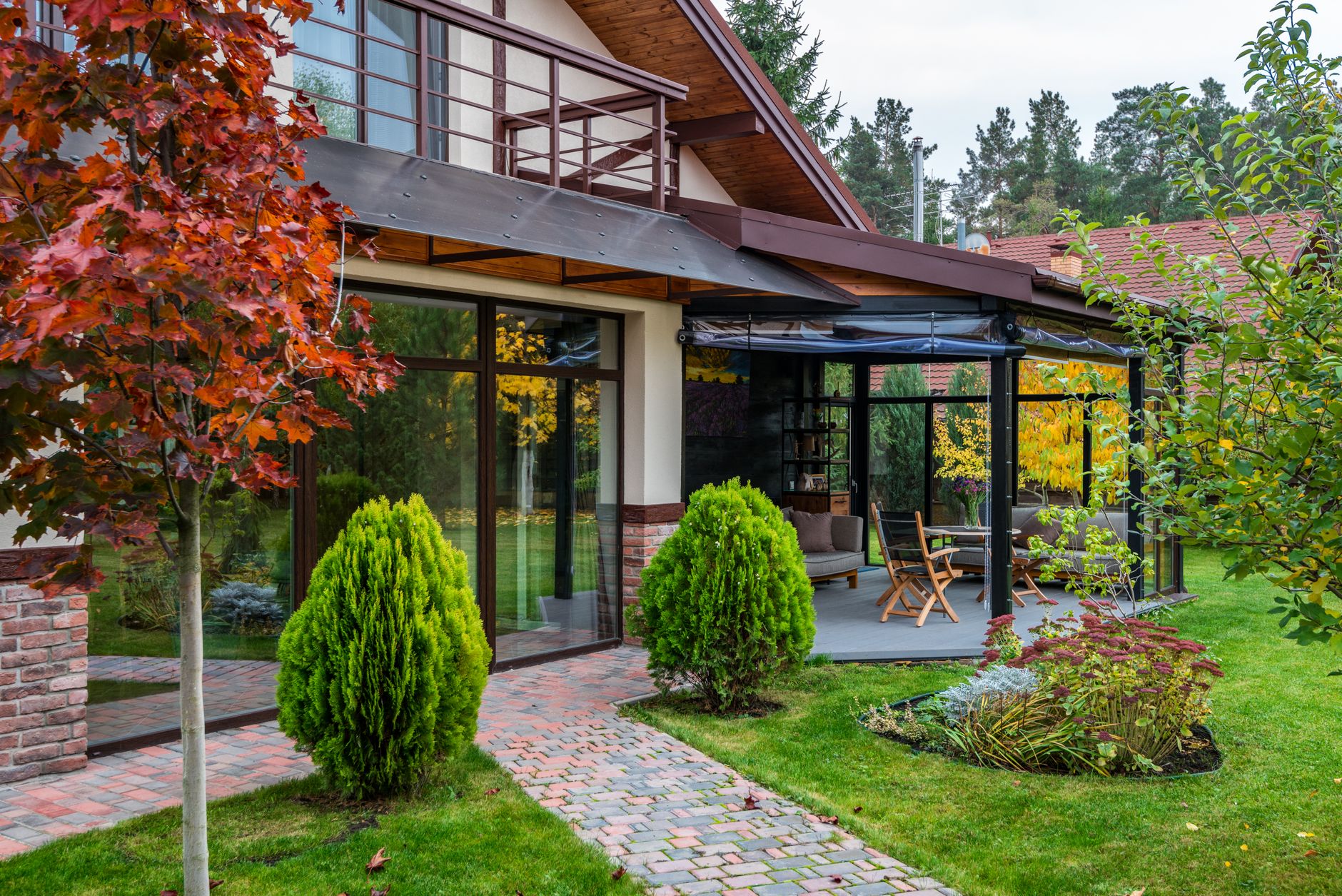 Modern backyard laneway-style cottage with terrace and garden landscaping