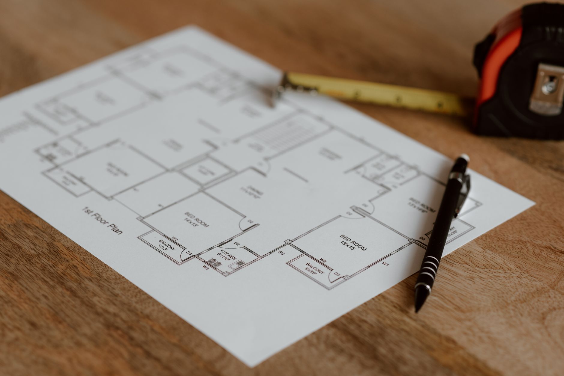 Architectural floor plan with pen and ruler laid out during a renovation project