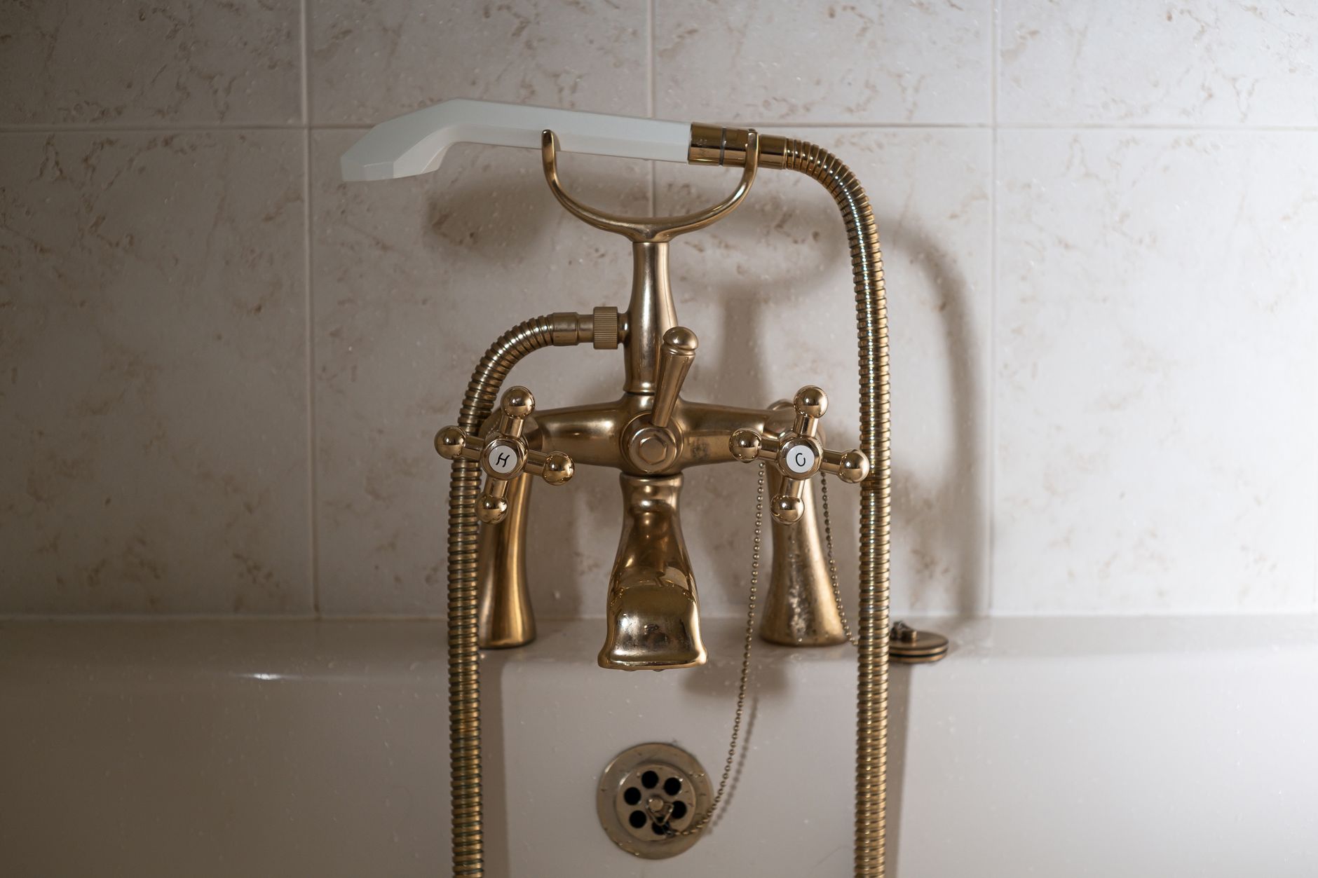 Bathtub faucet and diverter being replaced in a Markham condo bathroom