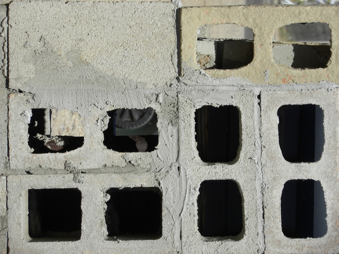 Close-up of hollow cinder block wall units planned for removal